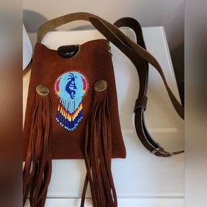 Native American Shinnecock handmade brown leather bag.